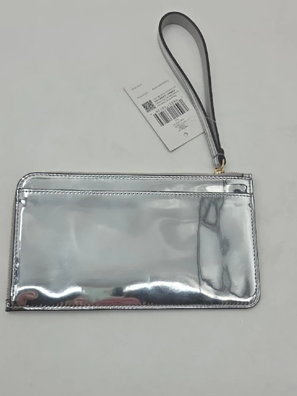kate spade Metallic Silver Zip Wristlet
